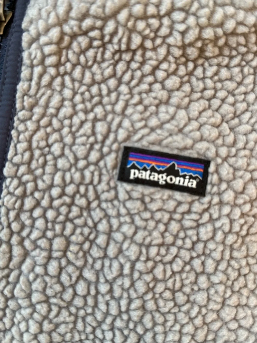 Patagonia Cream Sherpa Fleece Vest with Dark Trim